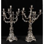 A pair of silver plated seven light candelabra in the 19th century manner