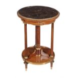 A French Empire style mahogany and gilt metal mounted occasional table