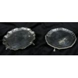 An Edwardian silver card tray and another