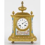 A French Sevres style porcelain and gilt metal mantel clock