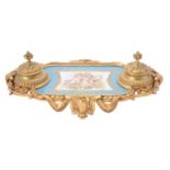 A French gilt metal mounted and Paris porcelain encrier in the Sevres style