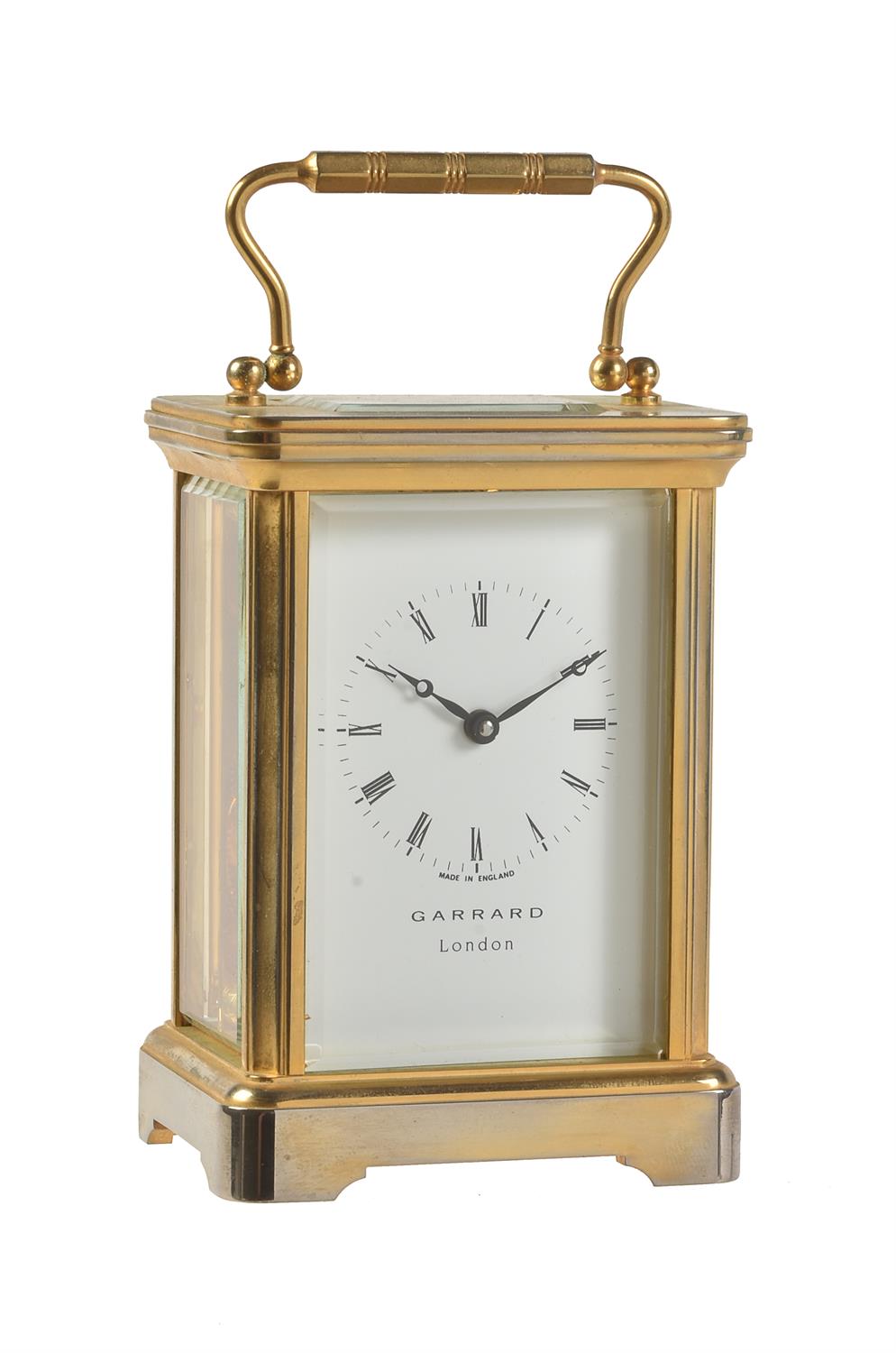An English gilt brass carriage timepiece