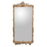 A giltwood wall mirror in George III style