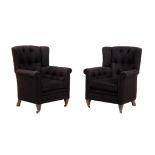 A pair of hardwood and upholstered armchairs