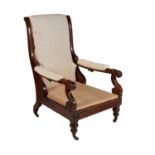 A George IV carved mahogany reclining armchair