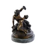A colour patinated bronze model of a satyr and nymph