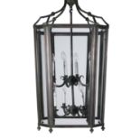 A large patinated metal and glazed hall lantern