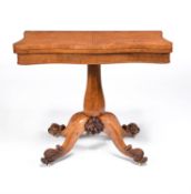 A William IV pollard oak and carved oak folding tea table, circa 1835