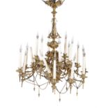 A French gilt metal eighteen light chandelier in Pompeian Revival style