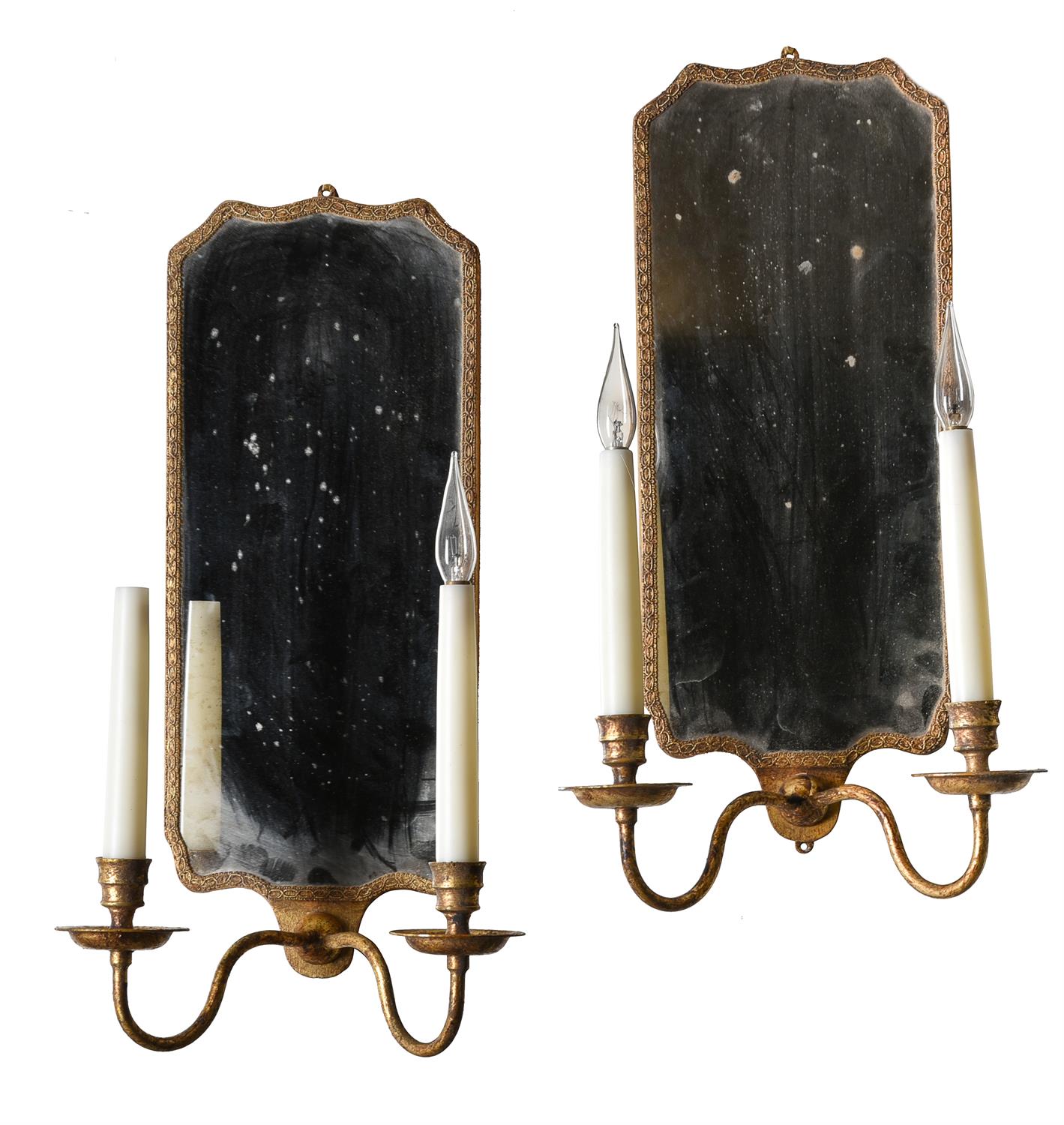 A pair of gilt and mirrored twin branch girandoles