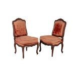 A pair of Louis XV walnut and velvet upholstered side chairs