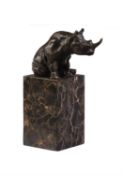 A French patinated bronze model of a rhinoceros