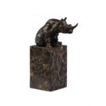 A French patinated bronze model of a rhinoceros