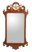 A George III walnut and parcel gilt fretwork wall mirror