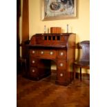 A mahogany cylinder desk