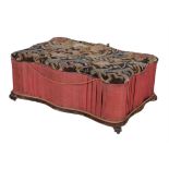 Y An early Victorian rosewood veneered and upholstered ottoman