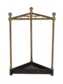 A Victorian brass and cast iron stick stand