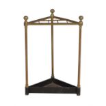 A Victorian brass and cast iron stick stand