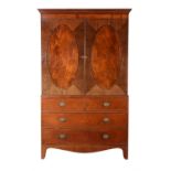 A George III mahogany and goncalo alves banded clothes press