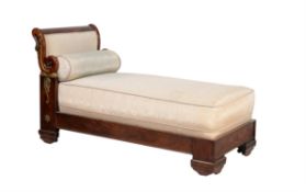 λ A mahogany, parcel git and gilt metal mounted daybed, in Empire style