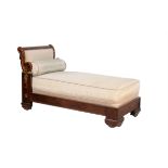 λ A mahogany, parcel git and gilt metal mounted daybed, in Empire style