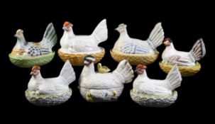 A group of seven assorted Staffordshire hen tureens and and ozier-moulded bases