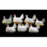 A group of seven assorted Staffordshire hen tureens and and ozier-moulded bases