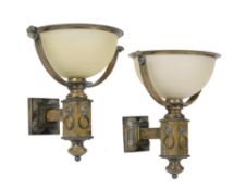A pair of gilt and brushed metal and frosted glass wall lights