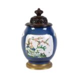 An Edme Samson powder-blue ground and gilt-metal mounted ovoid vase in the famille verte style and a