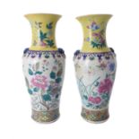 A pair of Chinese 'Famille Rose' vases