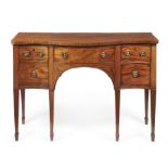 A George III mahogany serpentine fronted sideboard