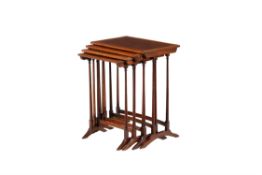 A nest of four mahogany and line inlaid quartetto tables in Regency style