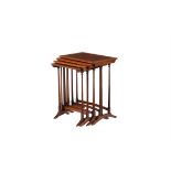 A nest of four mahogany and line inlaid quartetto tables in Regency style