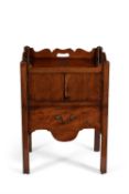 A George III mahogany bedside cupboard