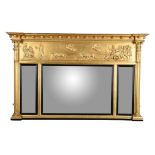 An early Victorian giltwood and composition overmantel wall mirror