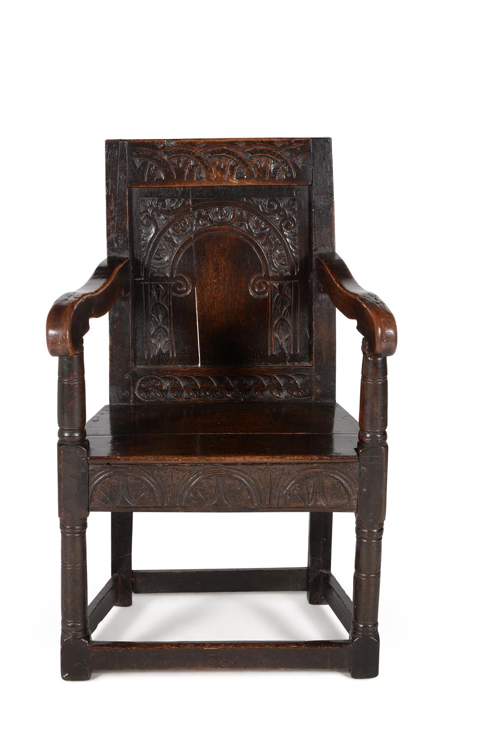 An oak wainscot armchair