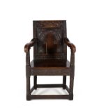 An oak wainscot armchair