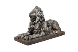 A Victorian glazed stoneware model of a recumbent lion