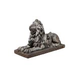 A Victorian glazed stoneware model of a recumbent lion