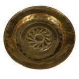 A Nuremberg brass alms dish