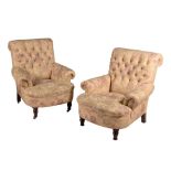 A pair upholstered armchairs in Late Victorian style