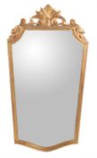 A giltwood wall mirror in late 18th century style