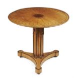A Gothic Revival 'bird's eye' maple and inlaid circular table