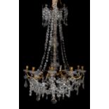 A moulded glass and gilt metal mounted eight branch chandelier