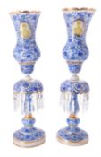 A pair of Beykoz glass storm lanterns with medallions of Mozzaffar ad-Din Shah Qajar