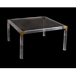 A square Perspex, smoked glass and brass mounted dining table