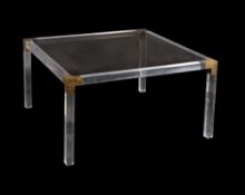 A square Perspex, smoked glass and brass mounted dining table