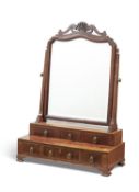 A mahogany and inlaid dressing mirror