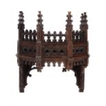 A Gothic Revival carved oak canopy