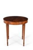 A satinwood and crossbanded circular centre table